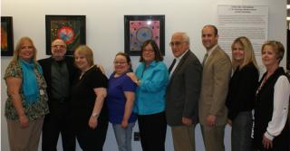 Pictured, left to right: FREE Divisional Director Susan Sorrentino, FREE Director of Art Therapy Ed Regensburg, FREE Artist Marie, FREE Artist Alicia, Patchogue-Medford Library Director Dina McNeece Chrils, Patchogue Village Mayor Paul Pontieri, Suffolk County Legislator Rob Calarco, FREE Divisional Director Anita Dowd, Head of Patchogue-Medford Children & Parent Services Jane Drake